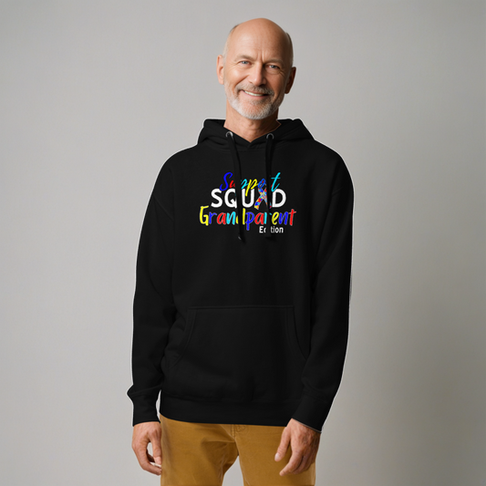 A man wearing a black hoodie with a colorful text design on the front, stating 'Autism Support Squad Grandparent' with an Autism ribbon.